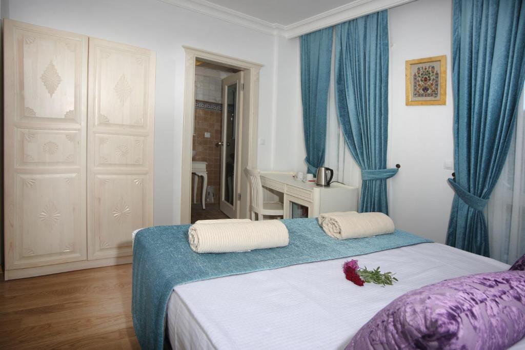 Petunya Konak Boutique Hotel İçmeler Bilik gambar