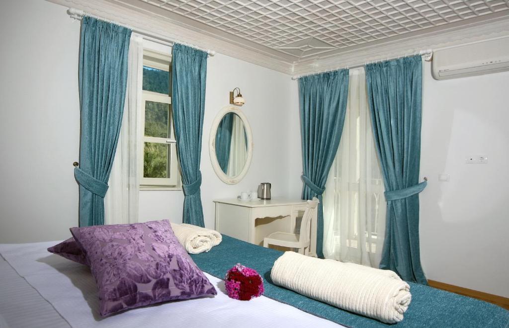 Petunya Konak Boutique Hotel İçmeler Bilik gambar