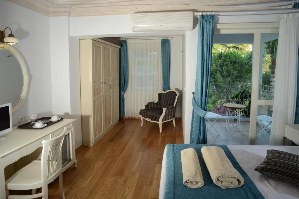 Petunya Konak Boutique Hotel İçmeler Bilik gambar